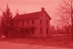 vacant house at pond, spring 61